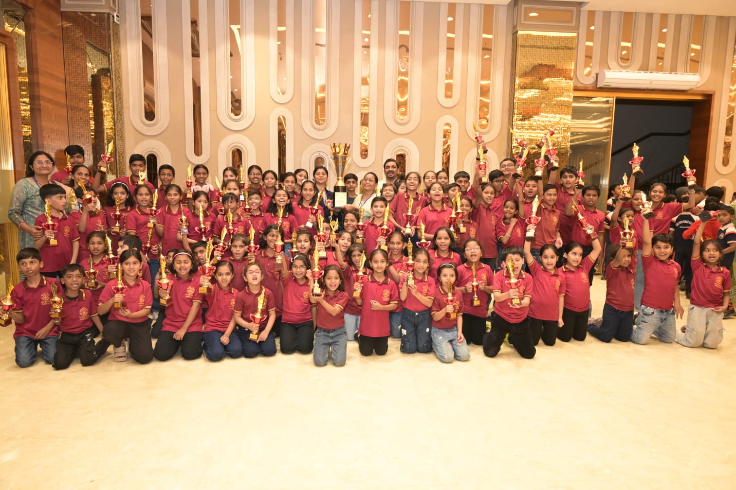 Genius Kids Academy students with trophies at International Abacus Competition